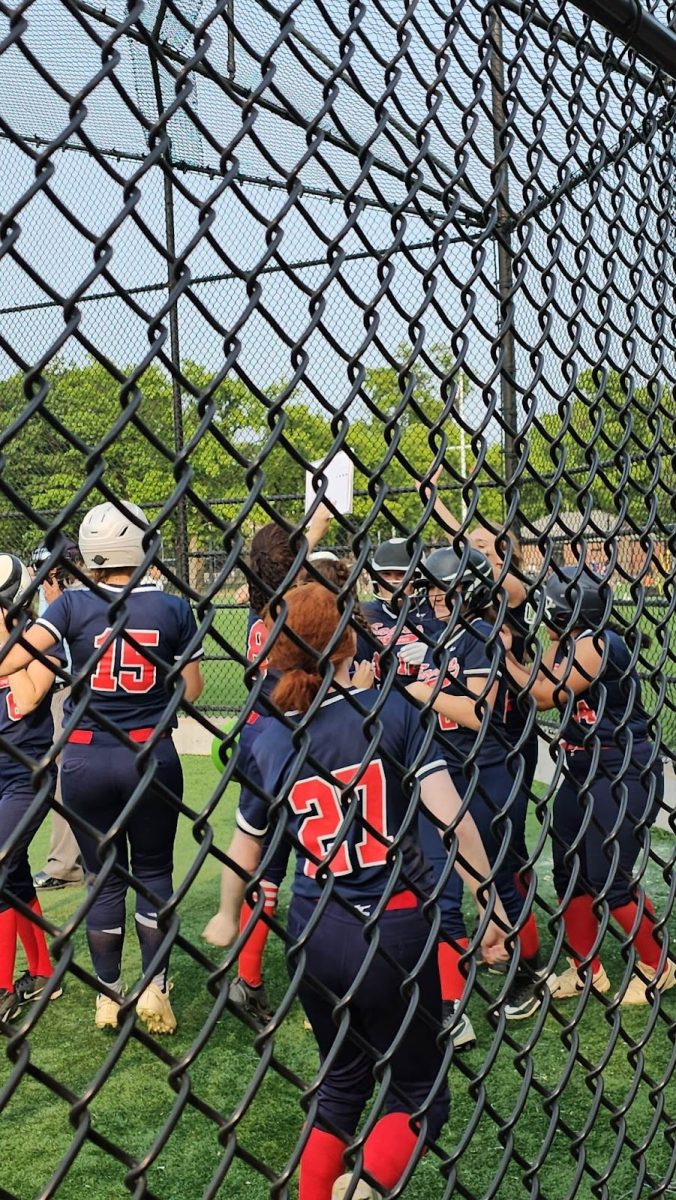 The girls softball team celebrates a strong season.